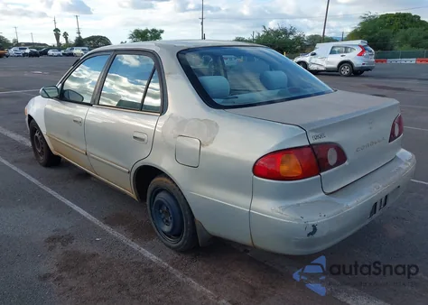 2001 Toyota Corolla Le z USA, uszkodzony, nr VIN 1NXBR12E21Z450378